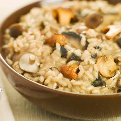 Risotto met paddestoelen en gedroogde champignons – Piet Huysentruyt